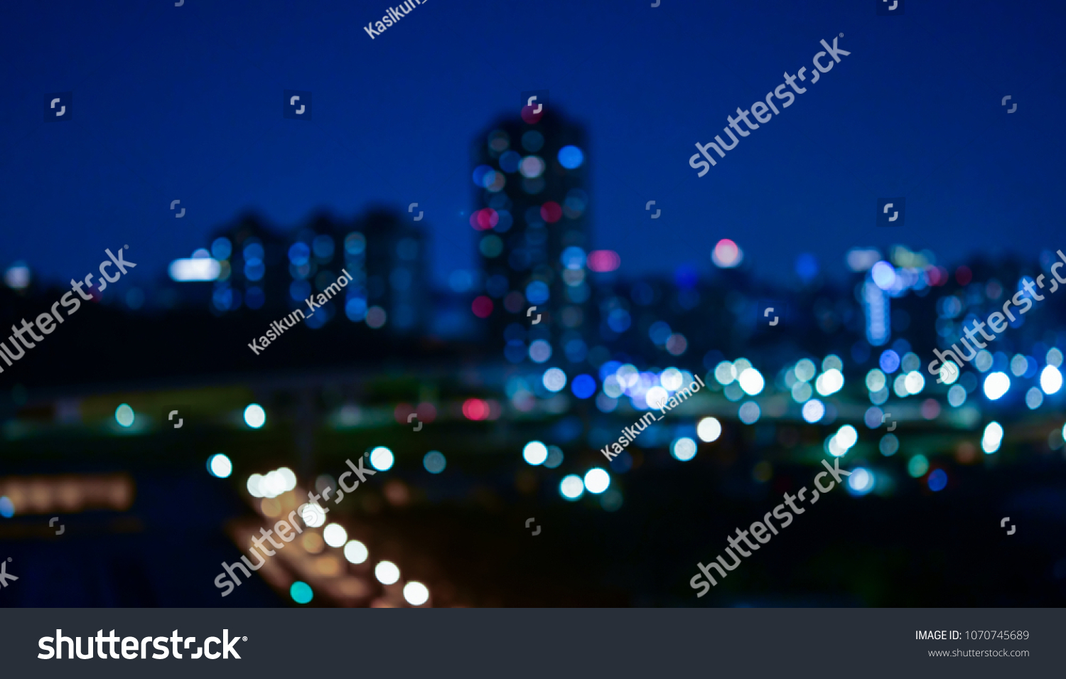 Night bokeh light in big city  abstract blur defocused background.