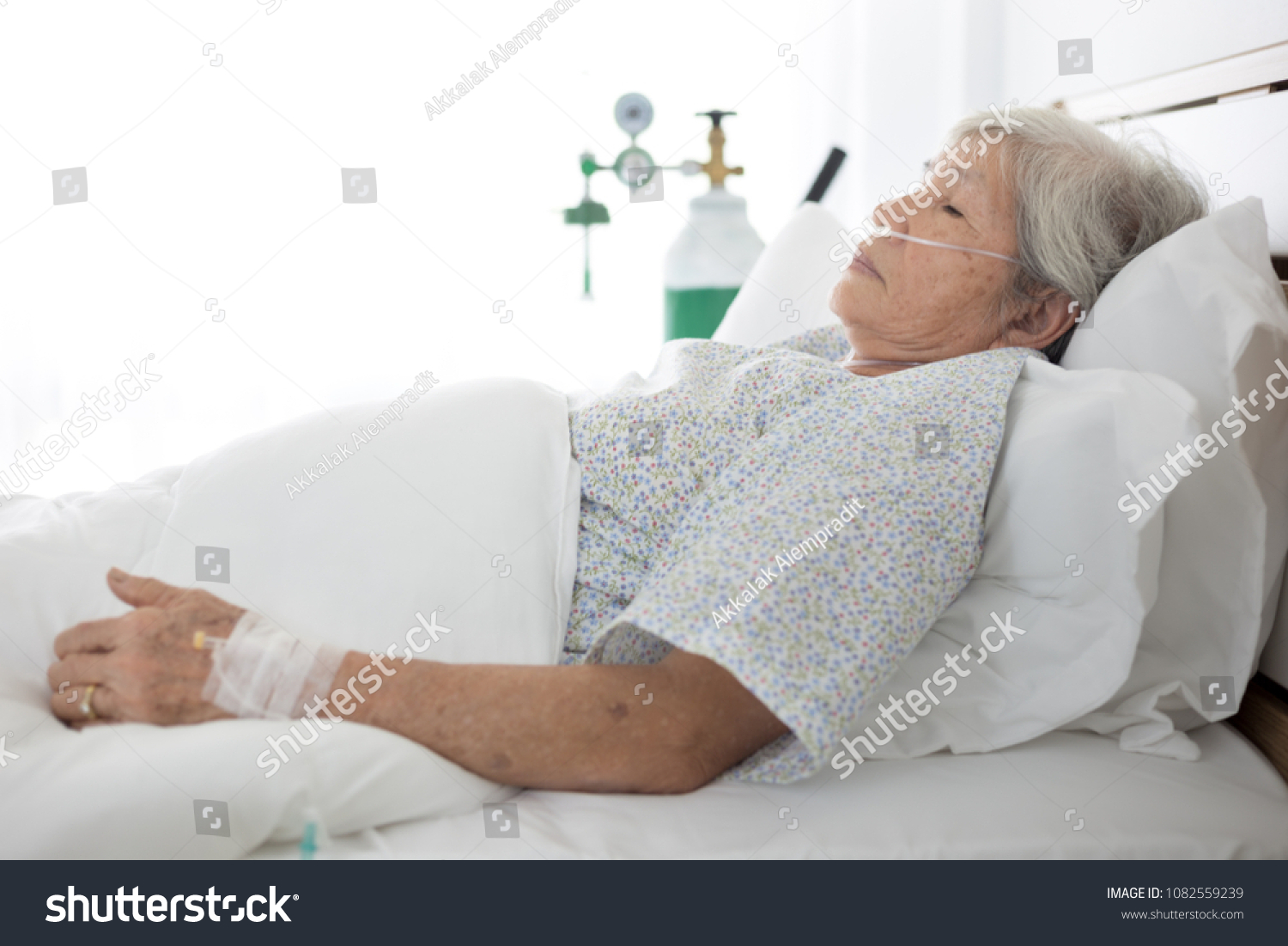 palliative care   old asian patient sleep on white bed
