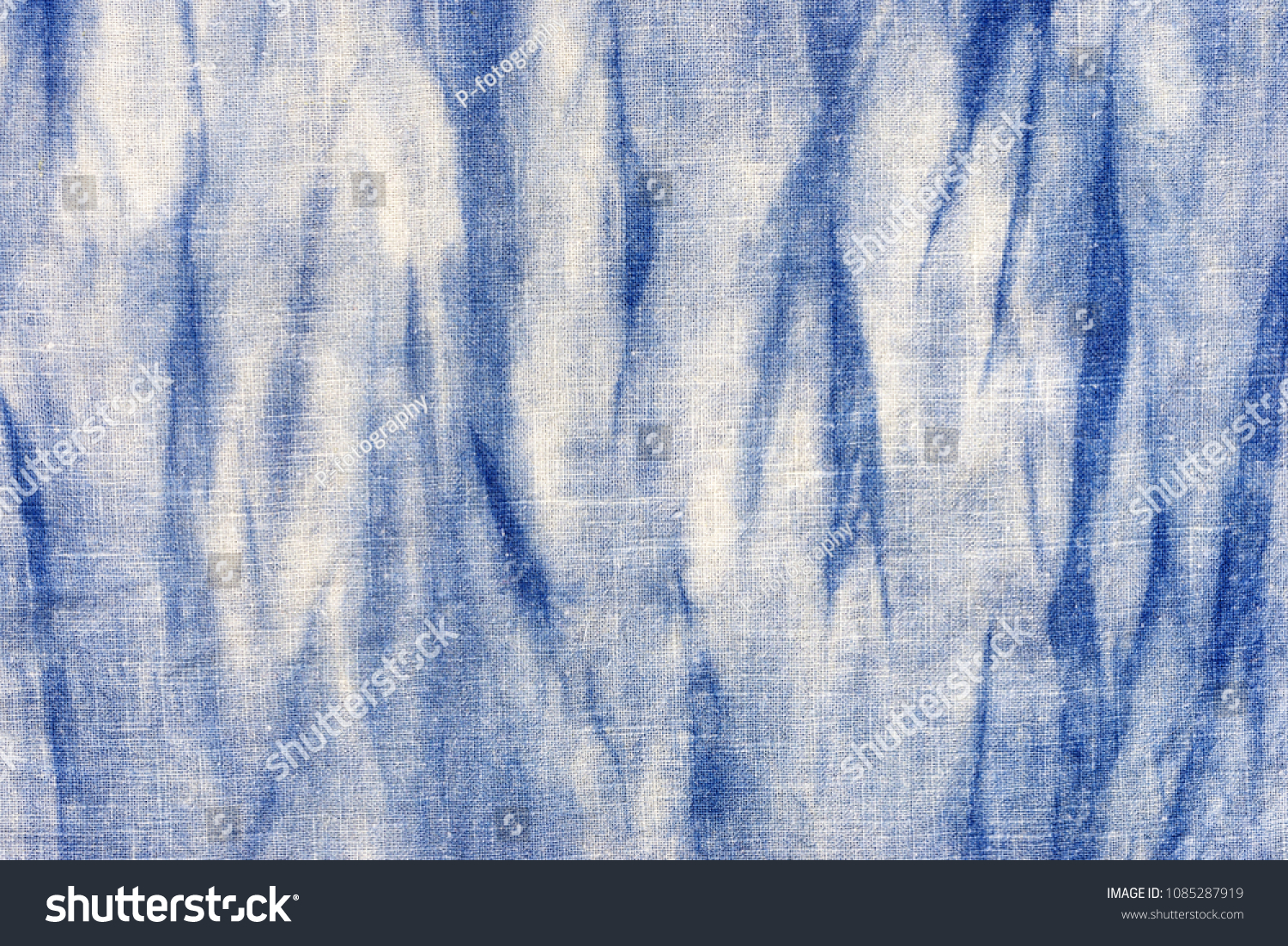 natural indigo blue tie dye on linen fabric texture  