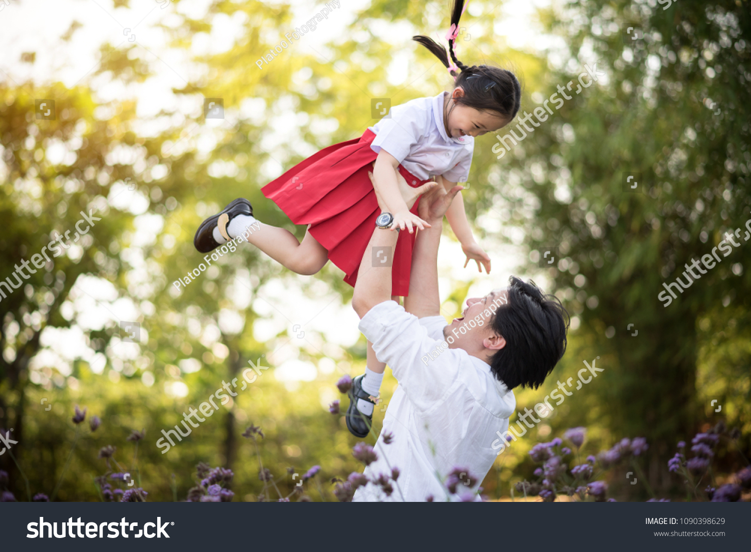 Happy Asian Family Father and Son on Vacation in the Park - Lifestyle Concept