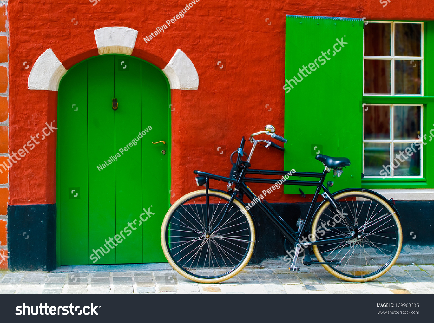 Colorful house with a bike near the entrance