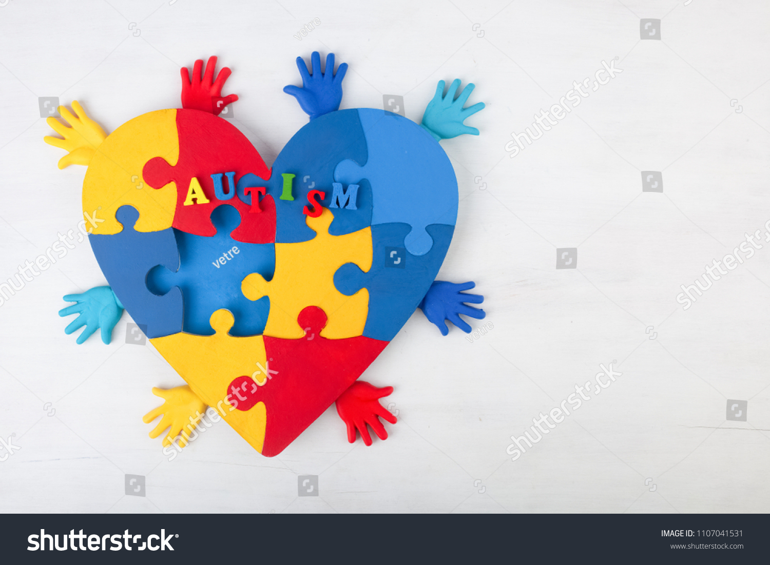 puzzle heart hands support autism awareness
