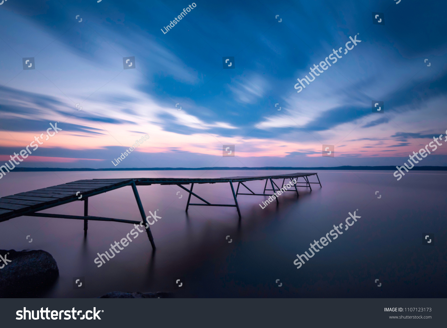 Jetty in sunset with long exposure
