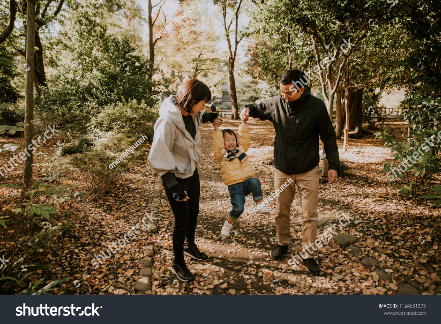 Happy japanese family spending time outdoor