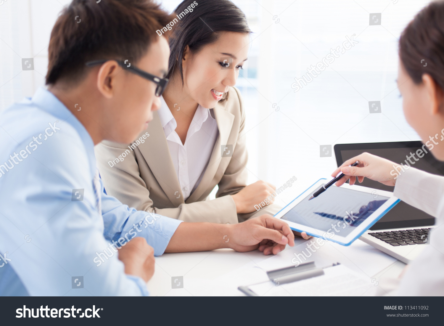 Ambitious business group being busy working on the project