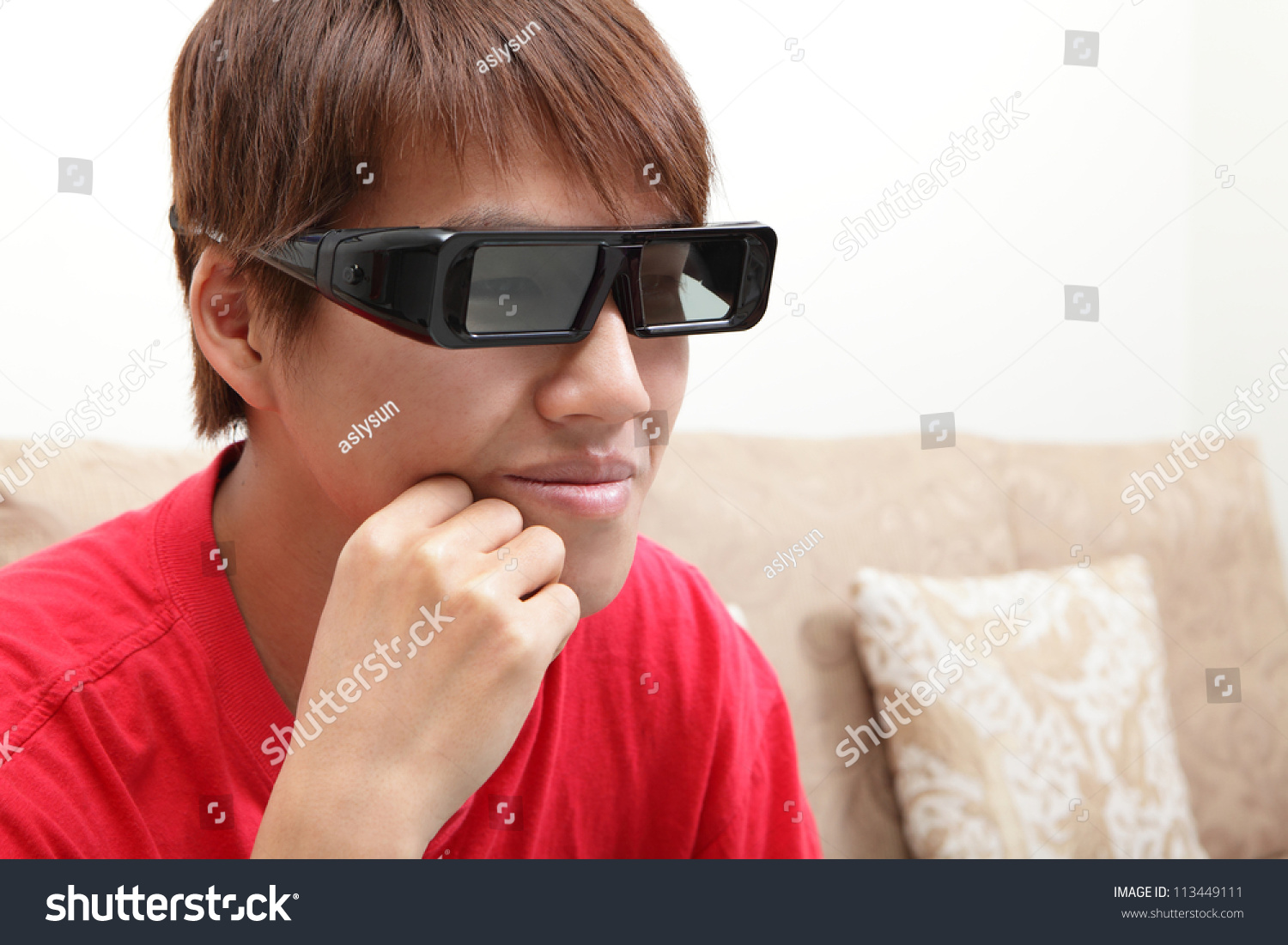 close up of Young man with threeD (3D) glasses on watching a 3D movie