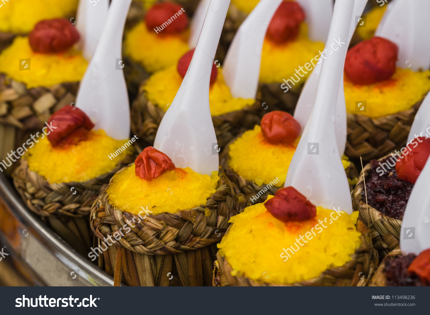 pineapple rice a tradtional appetizer in Yunnan province Southwest China. colorful sticky rice wrapped with leaves