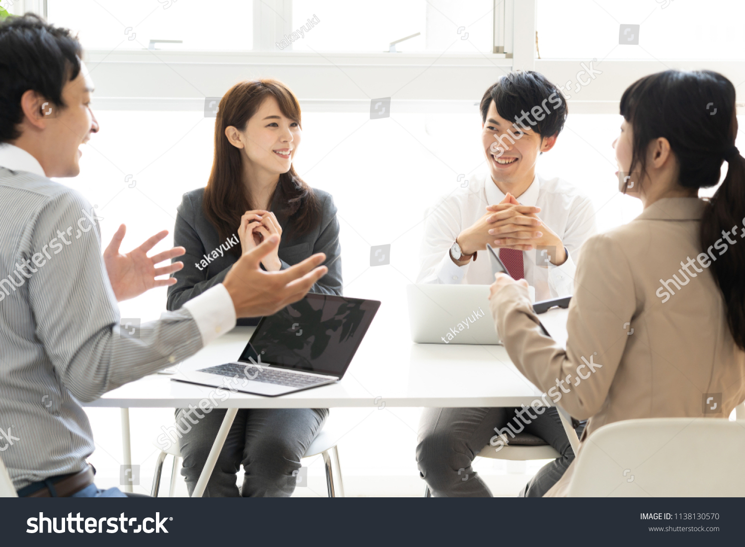 asian business group meeting in office