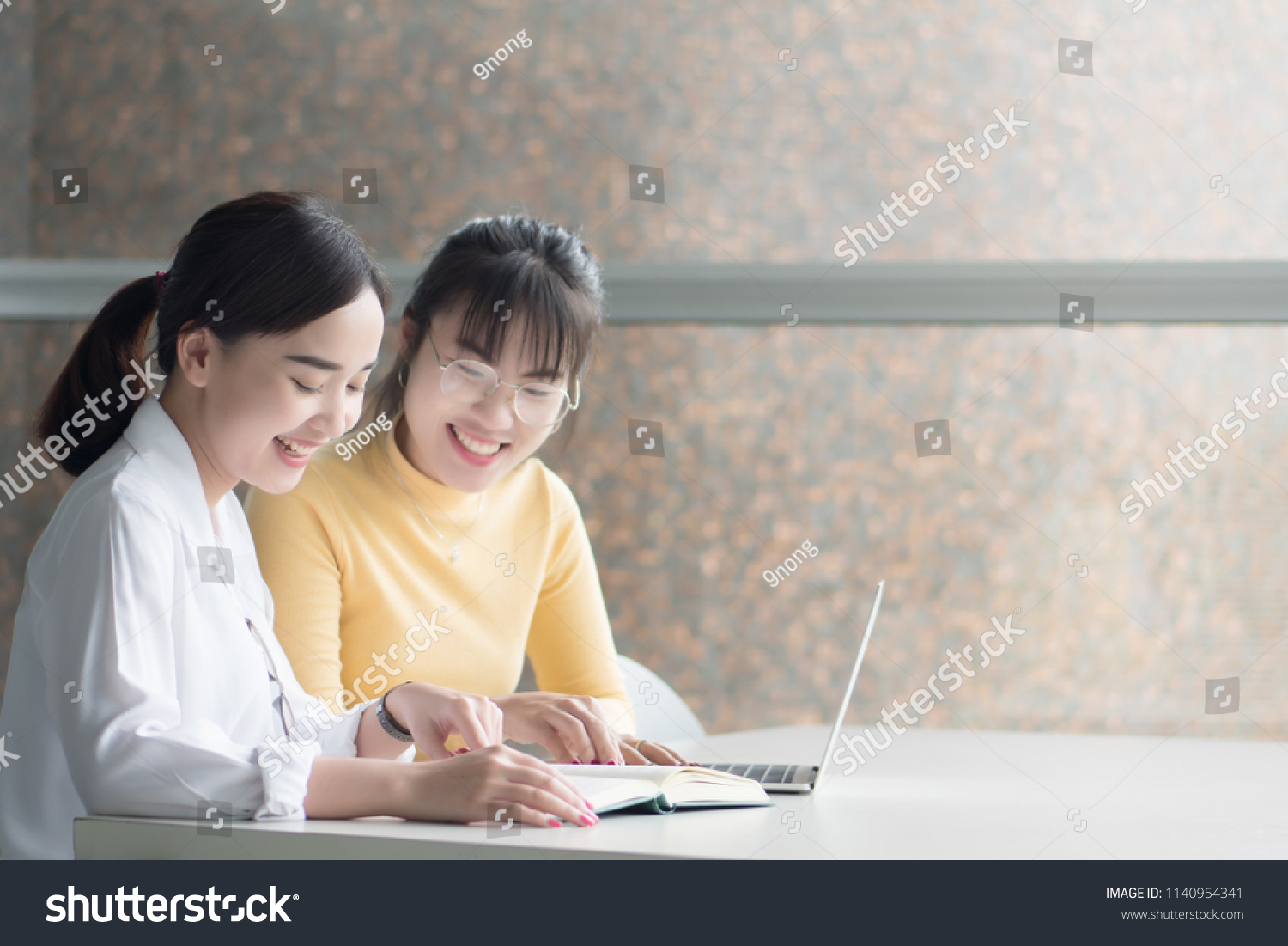smart woman college students getting back to school; portrait of happy smiling woman students studying in college level education fall or winter back to school concept; asian young adult woman model