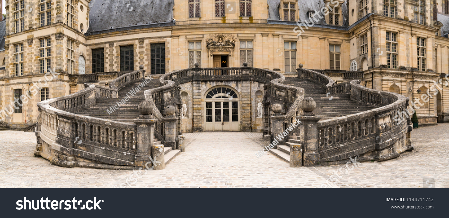 Grand stone stairs to an old medieval European castle