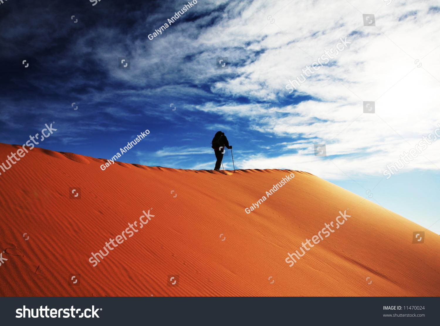 Men in sand desert
