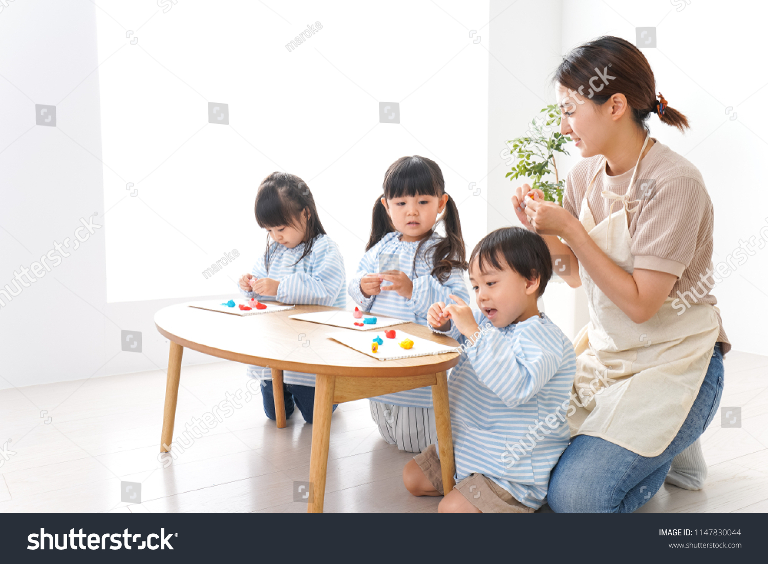 Children and teacher at kindergarten