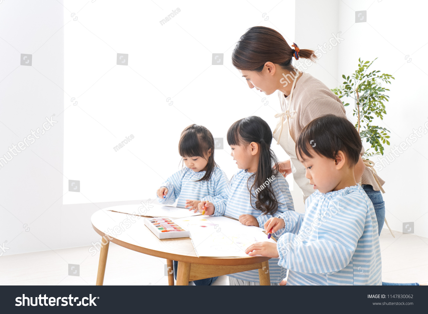 Children and teacher at kindergarten