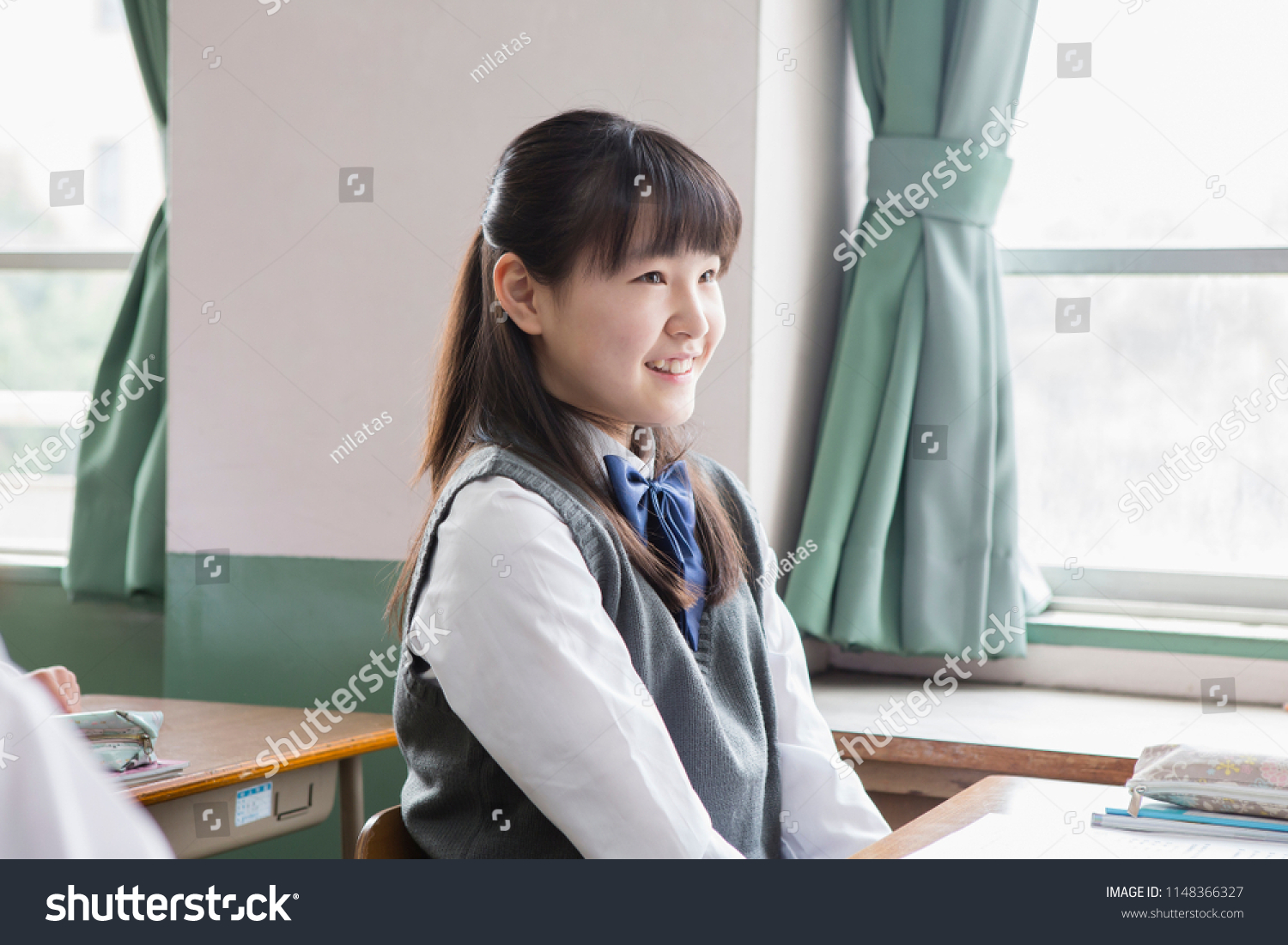 Japanese female student in class