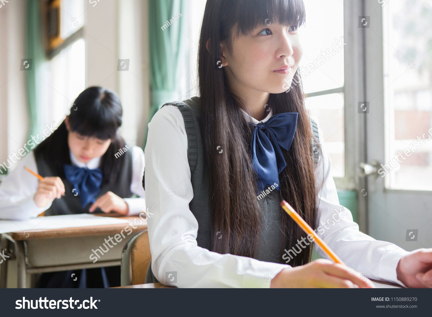 Japanese female student in class