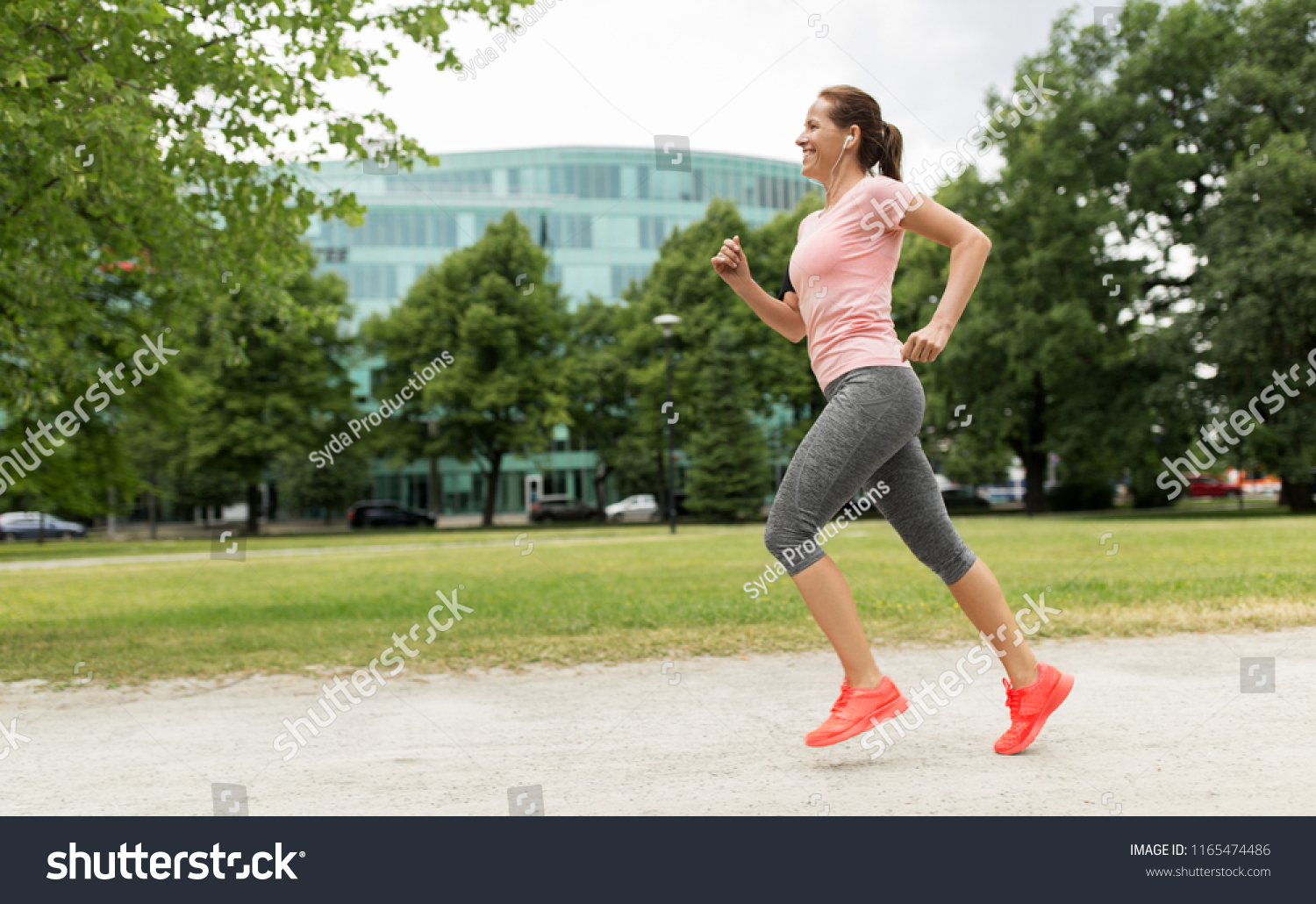 fitness sport and healthy lifestyle concept - smiling woman with ...