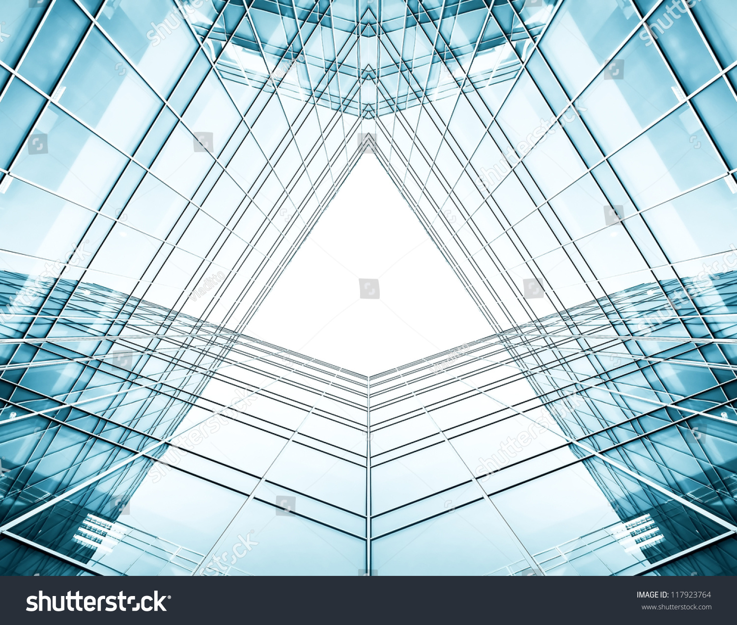 Panoramic and perspective wide angle view to steel blue background of glass high rise building skyscrapers in modern futuristic downtown at night Business concept of successful industrial architecture