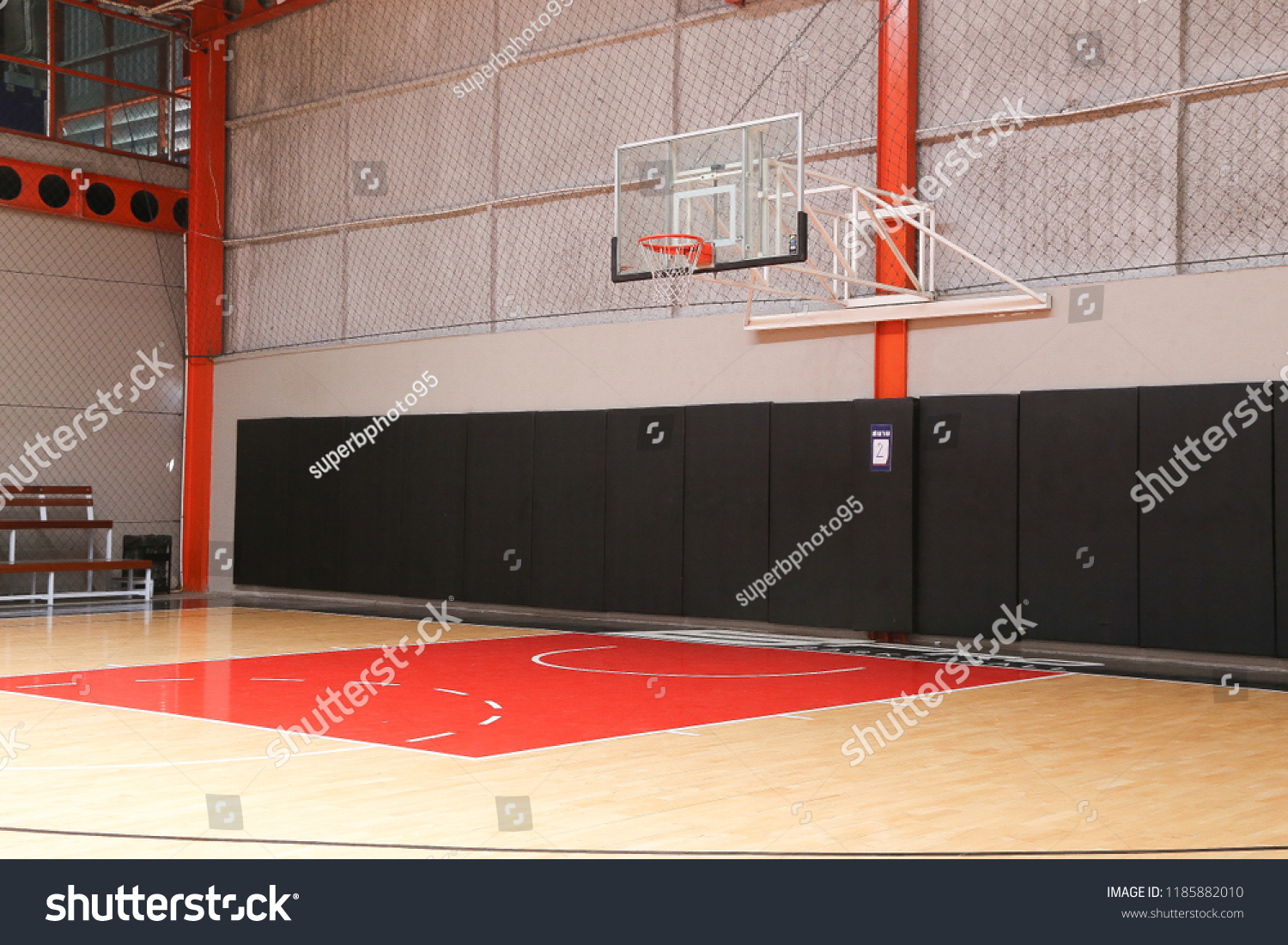 Basketball hoop on empty indoor court