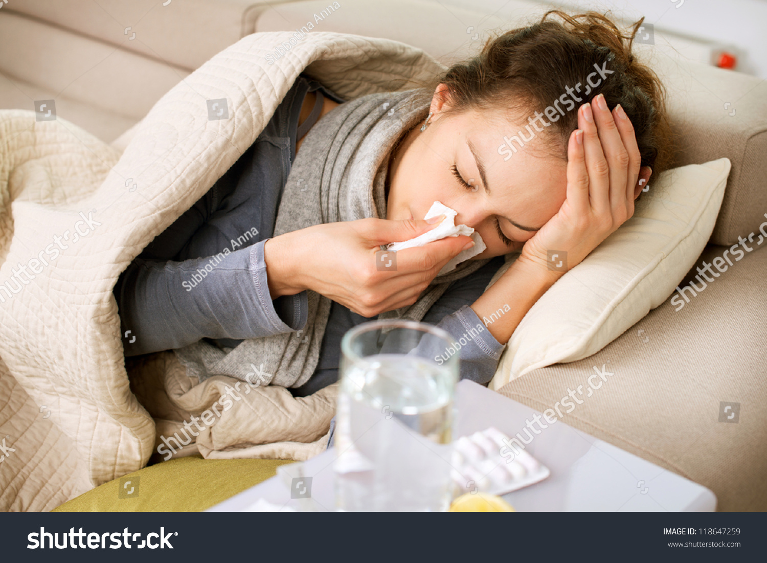 Sick Woman.Flu.Woman Caught Cold. Sneezing into Tissue. Headache. Virus .Medicines