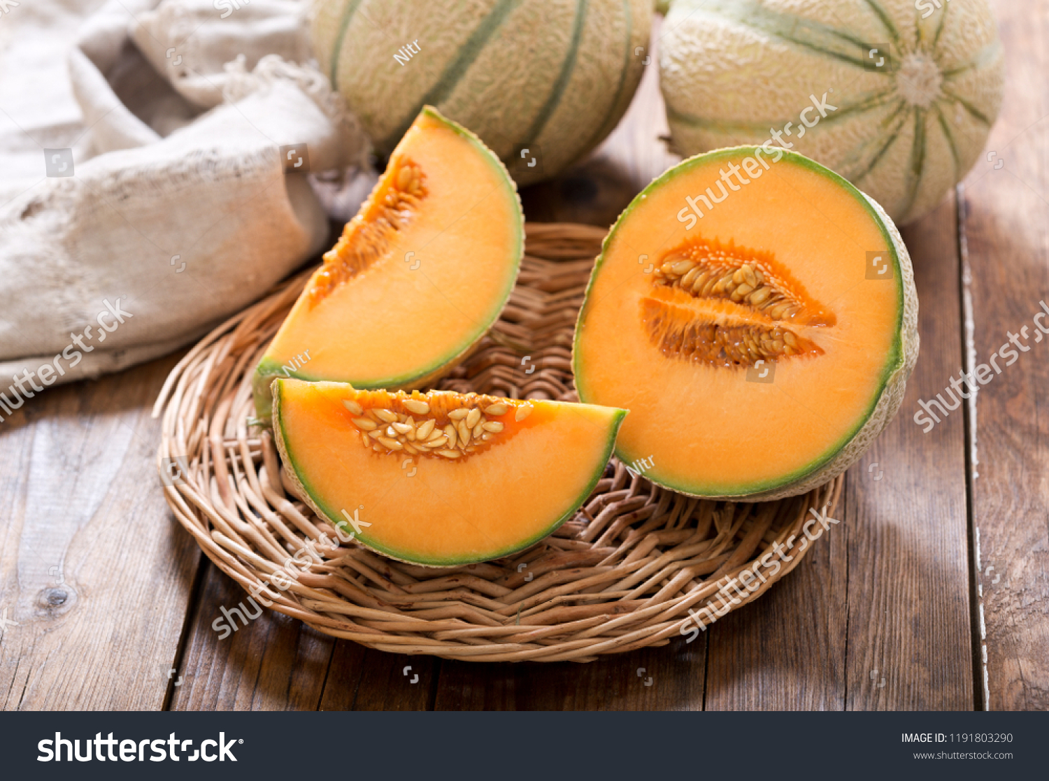 close up of cantaloupe melon on wooden table