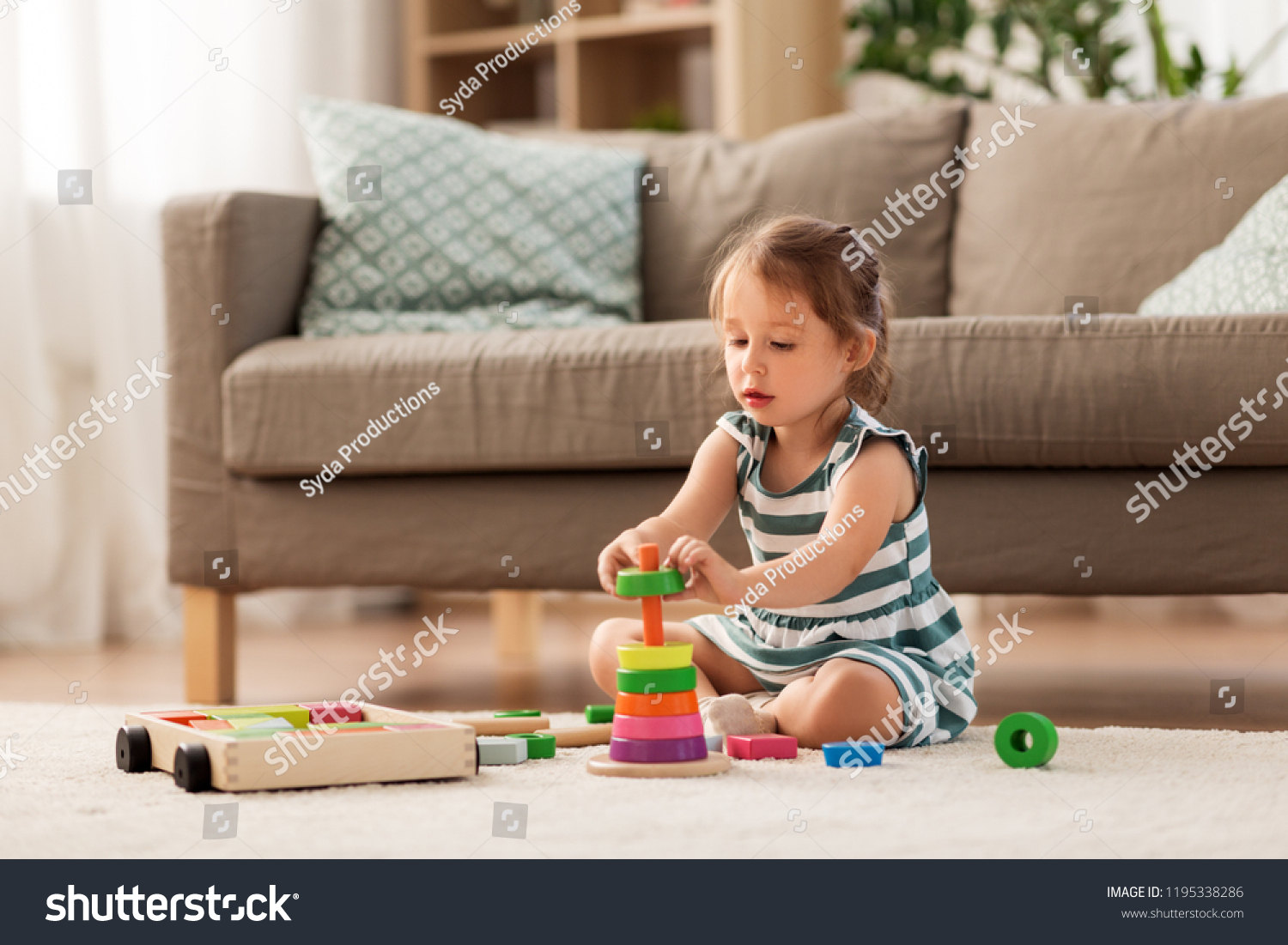 Childhood And People Concept Happy Three Years Old Baby Girl Playing childhood-and-people-concept-happy-three-years-old-baby-girl-playing