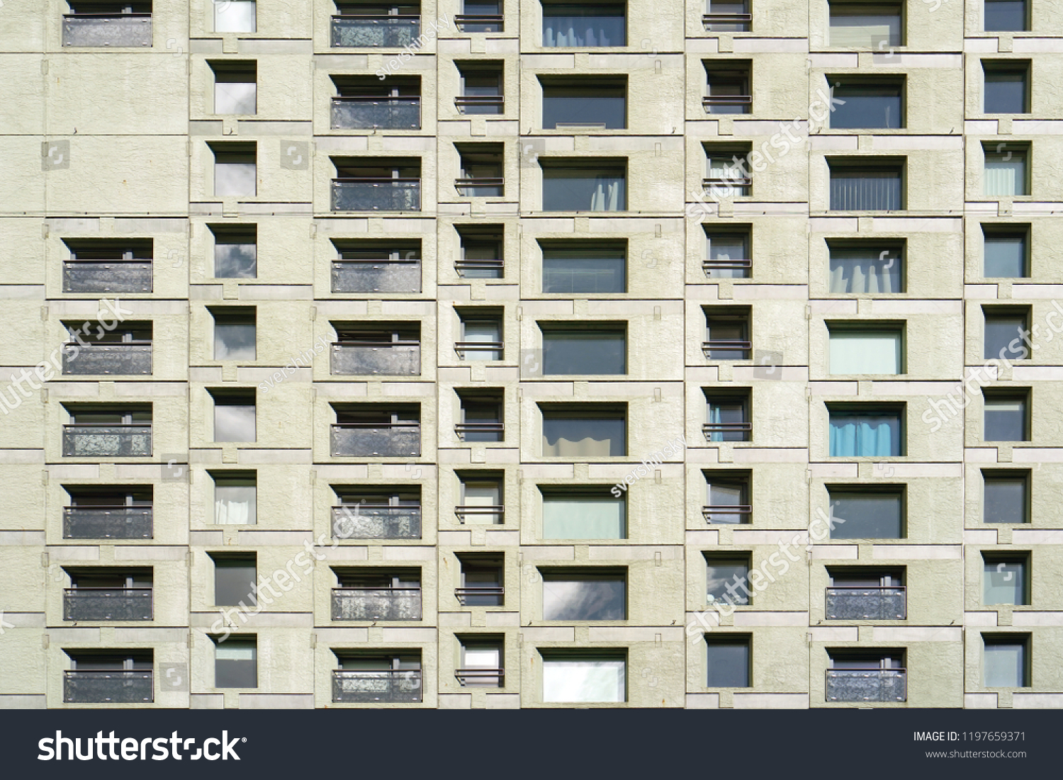 Repeating patterns architectural details and geometric constructions. Residential buildings. Pattern of windows and room in building