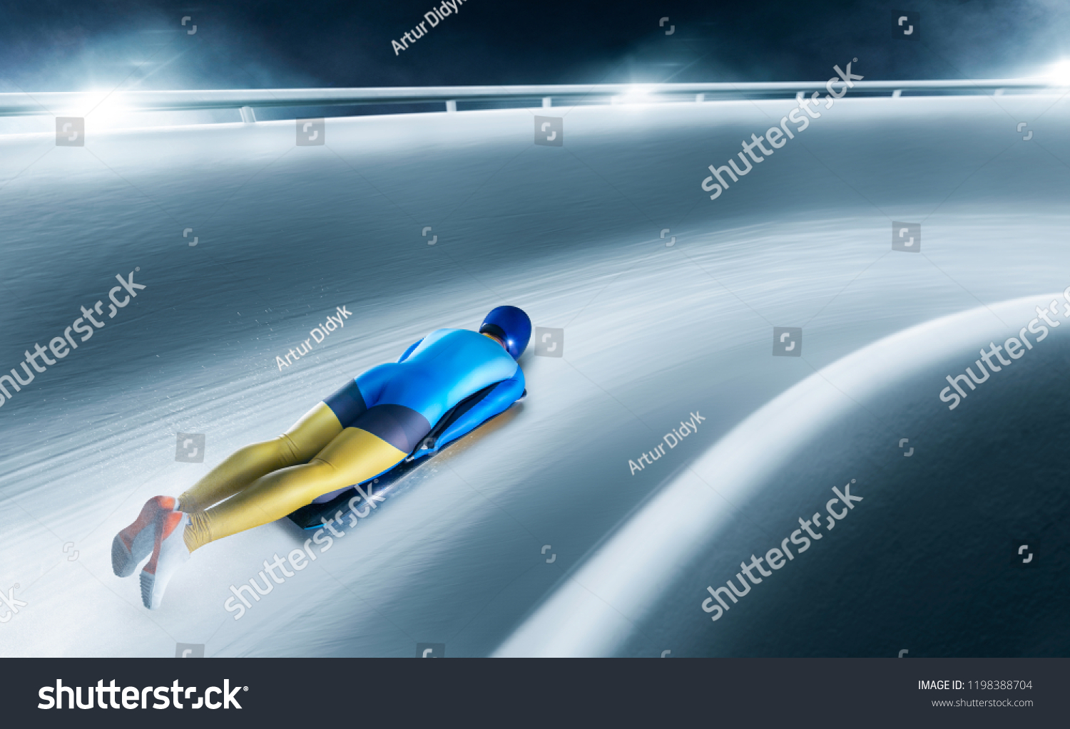 The athlete descends on a sleigh on an ice track
