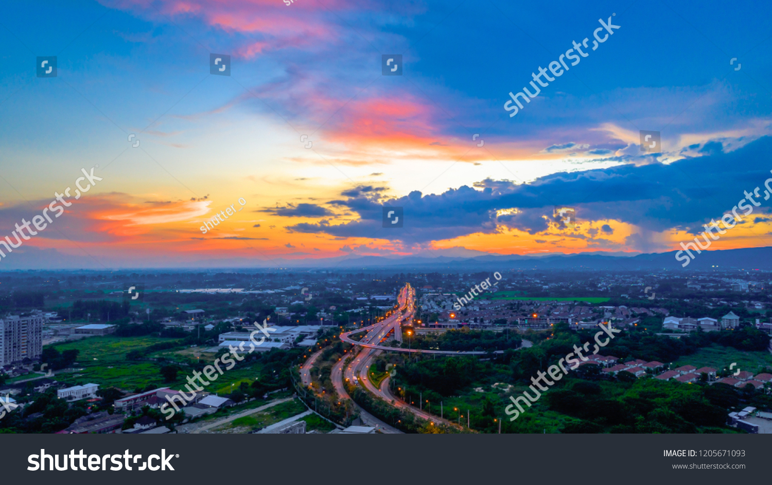 aerial view breautiful sunset Chiang mai city with ring road and traffic near chiang mai city Thailand