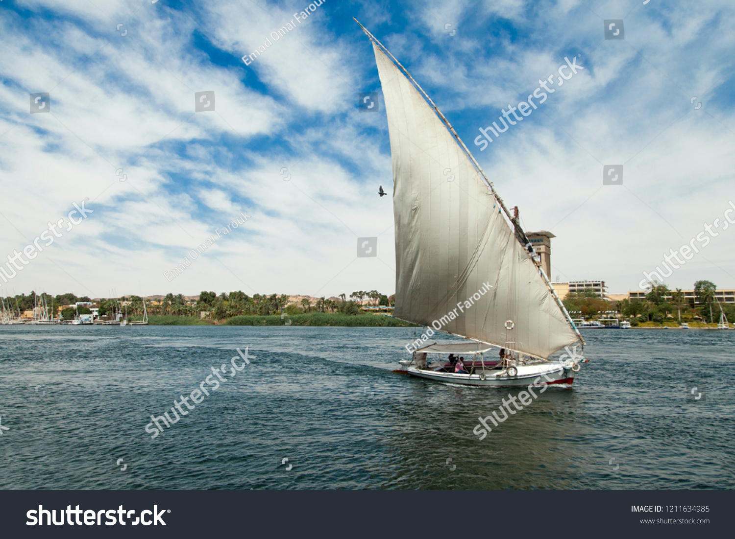 Sailboat or felucca with folded sail  in theNile River  Egypt  Aswan