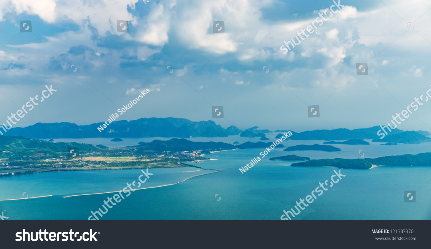 View of blue sky sea and mountain seen from Cable Car viewpoint Langkawi Malaysia. Picturesque landscape with tropical forest beaches small Islands in waters of Strait of Malacca