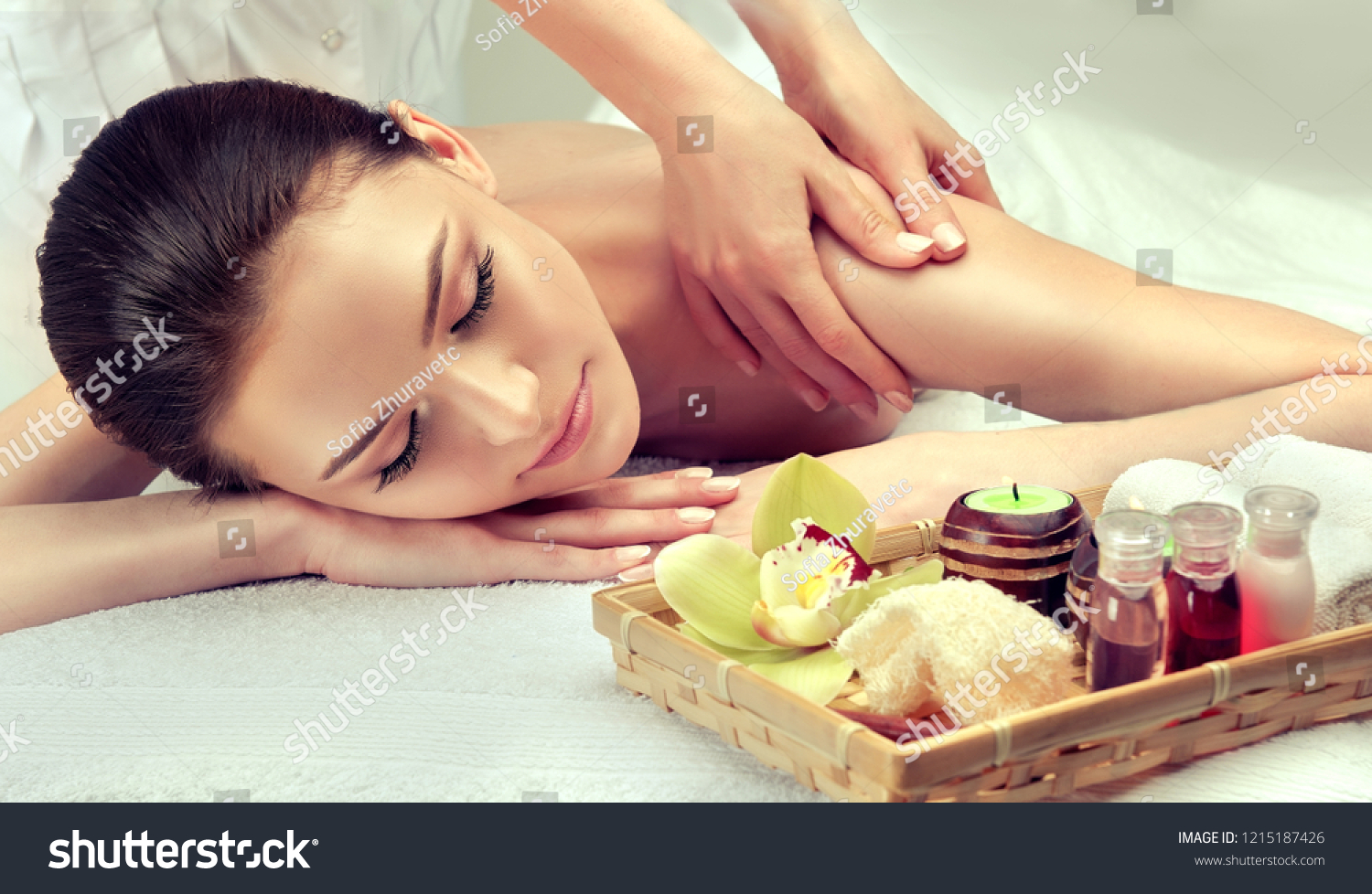 Massage and body care. Spa body massage woman hands treatment. Woman having massage in the spa salon for beautiful girl