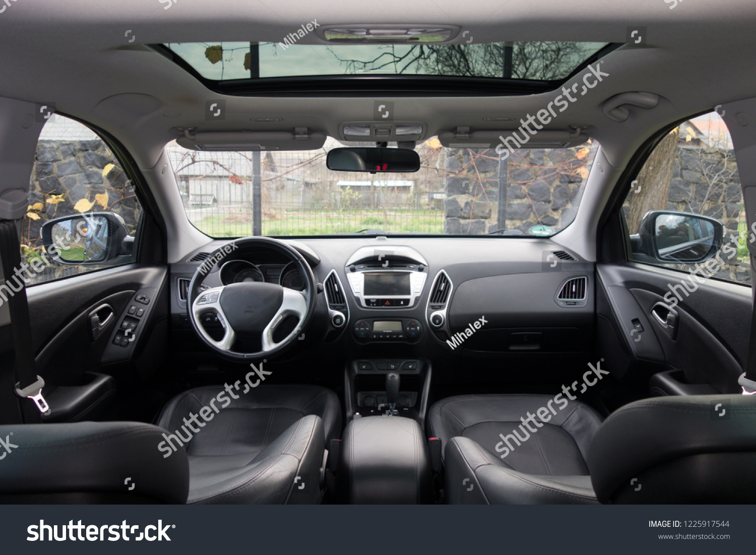Panoramic view inside car double sunroof hatch with tinted glass