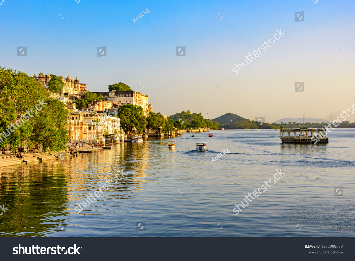 Panoramic view of city of lakes Udaipur with lake Pichola from Ambrai ghat Rajasthan  India.