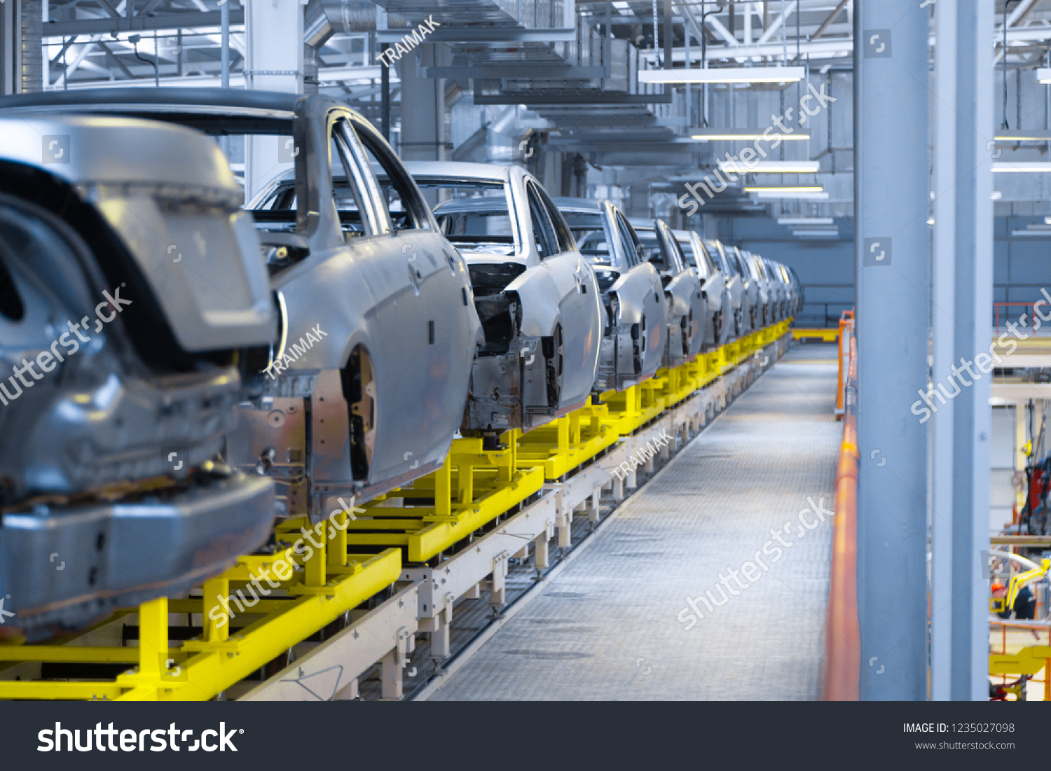 Movement of vehicles along the production line at the plant. Car Assembly shop. Car Assembly by parts