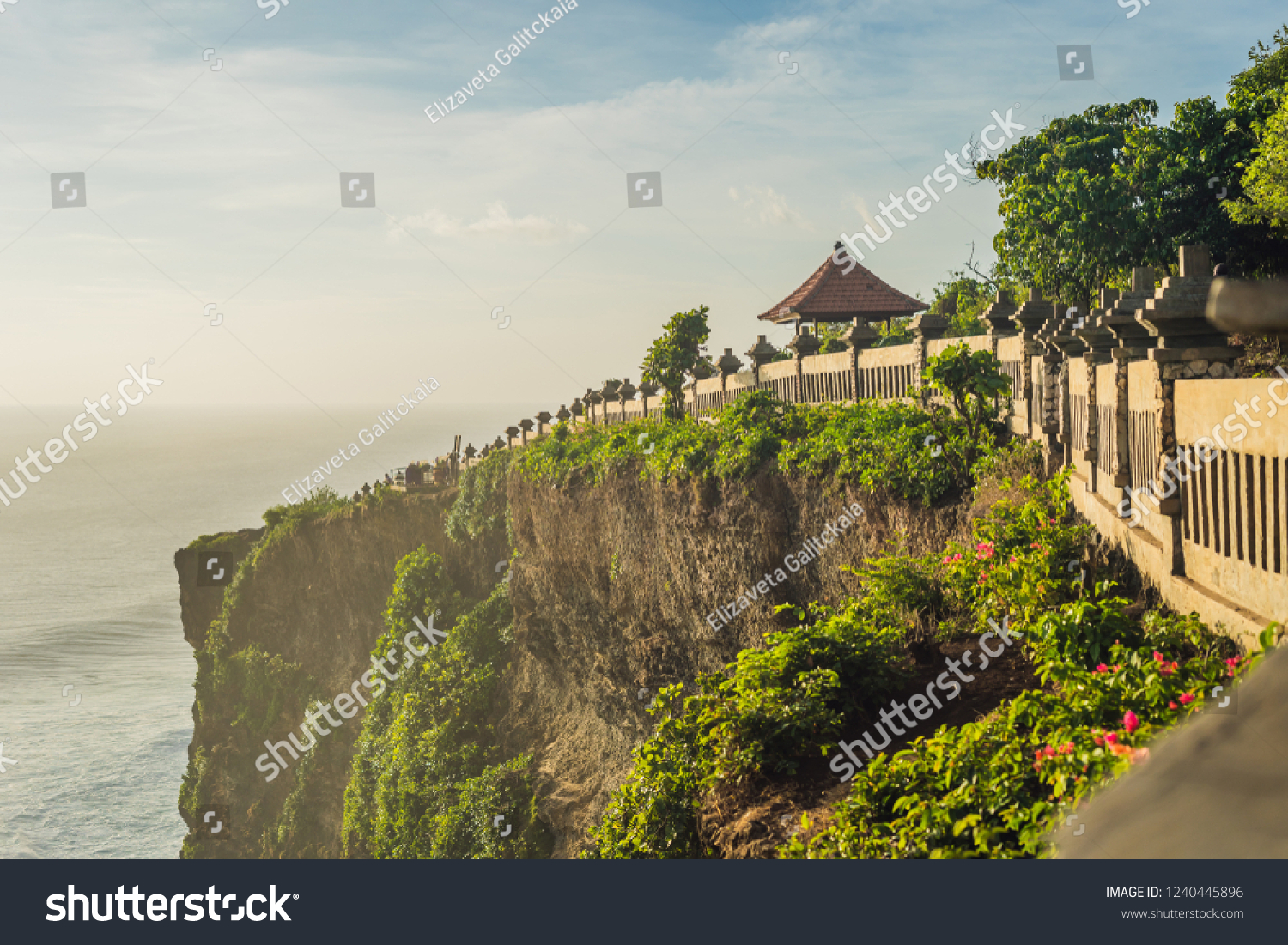 Pura Luhur Uluwatu temple  Bali  Indonesia. Amazing landscape - cliff with blue sky and sea