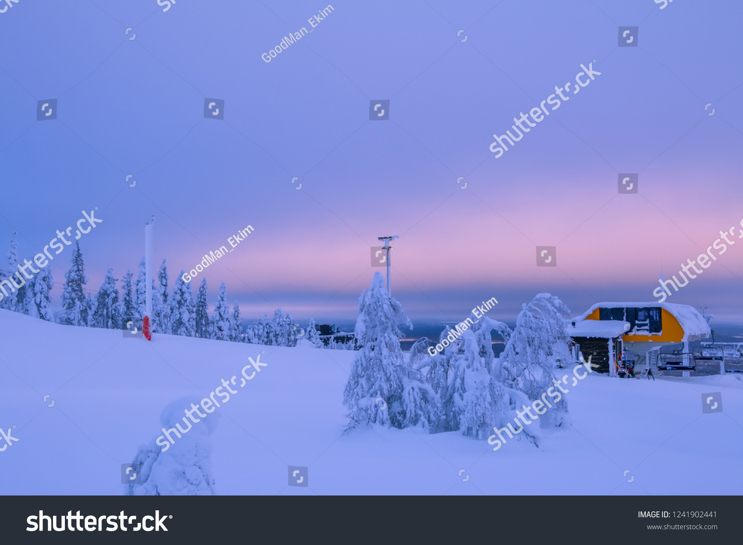 Winter Finland. Polar day. Ski lift station on top of the mountain. A lot of snow