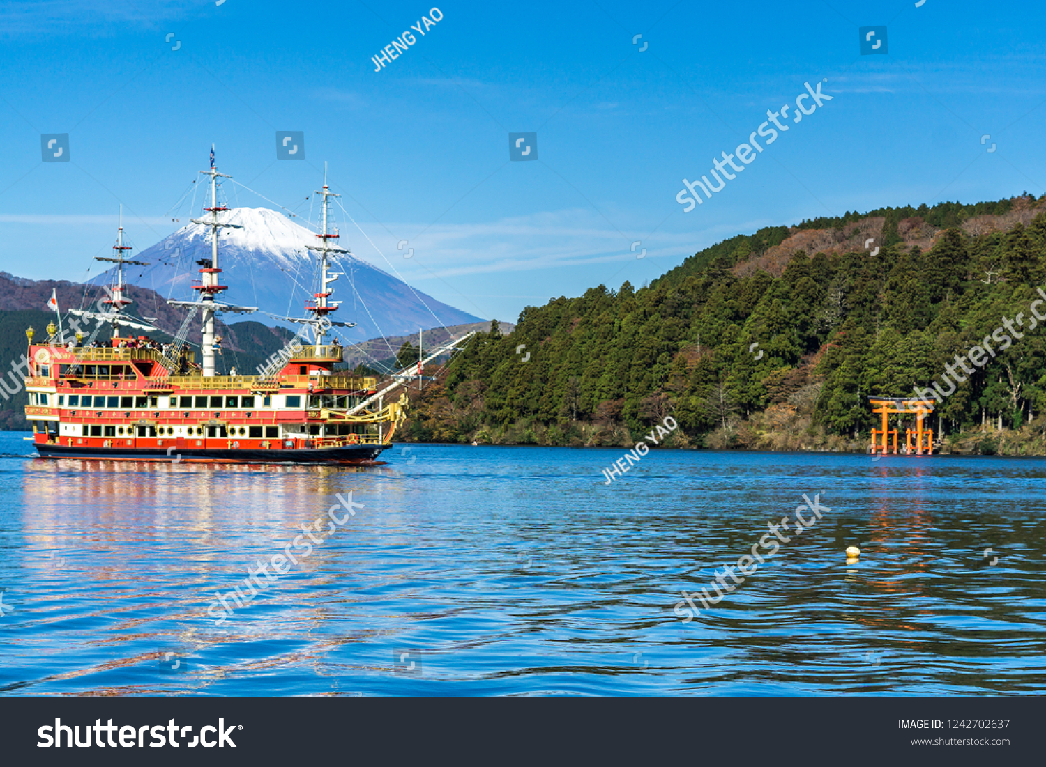 Mountain Fuji and Lake Ashi with Hakone temple and sightseeing boat in autumn