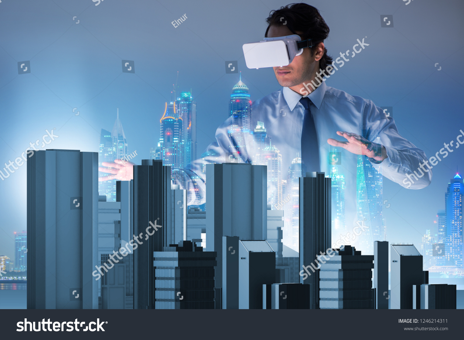 Man with virtual reality goggles doing urban planning