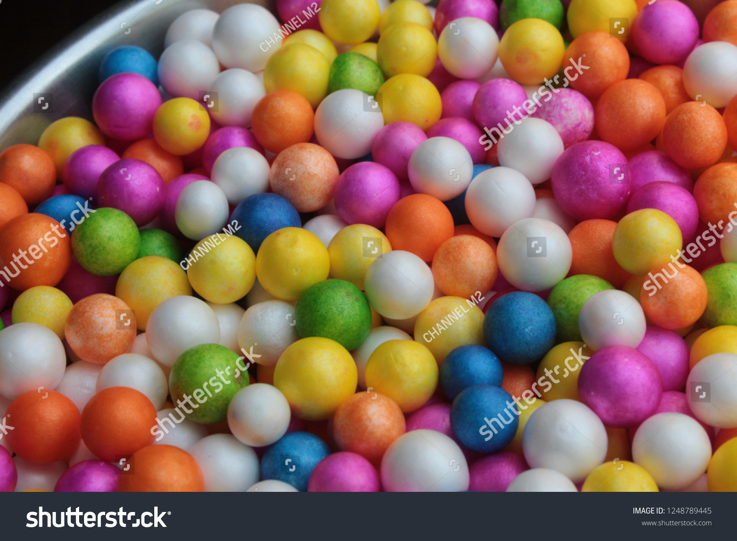 a colorful assortment of shiny round balls
