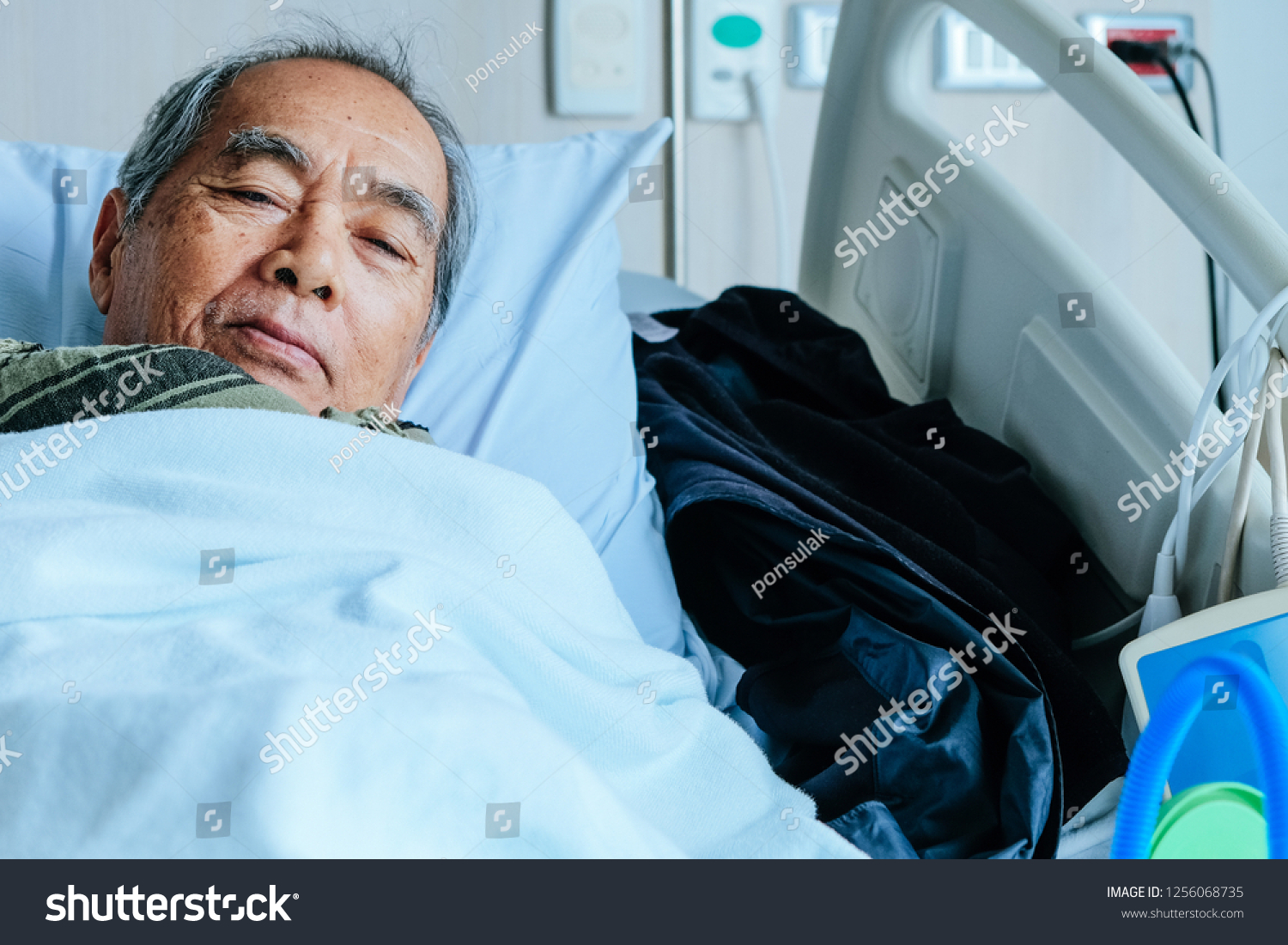 Elderly patients in hospital bed