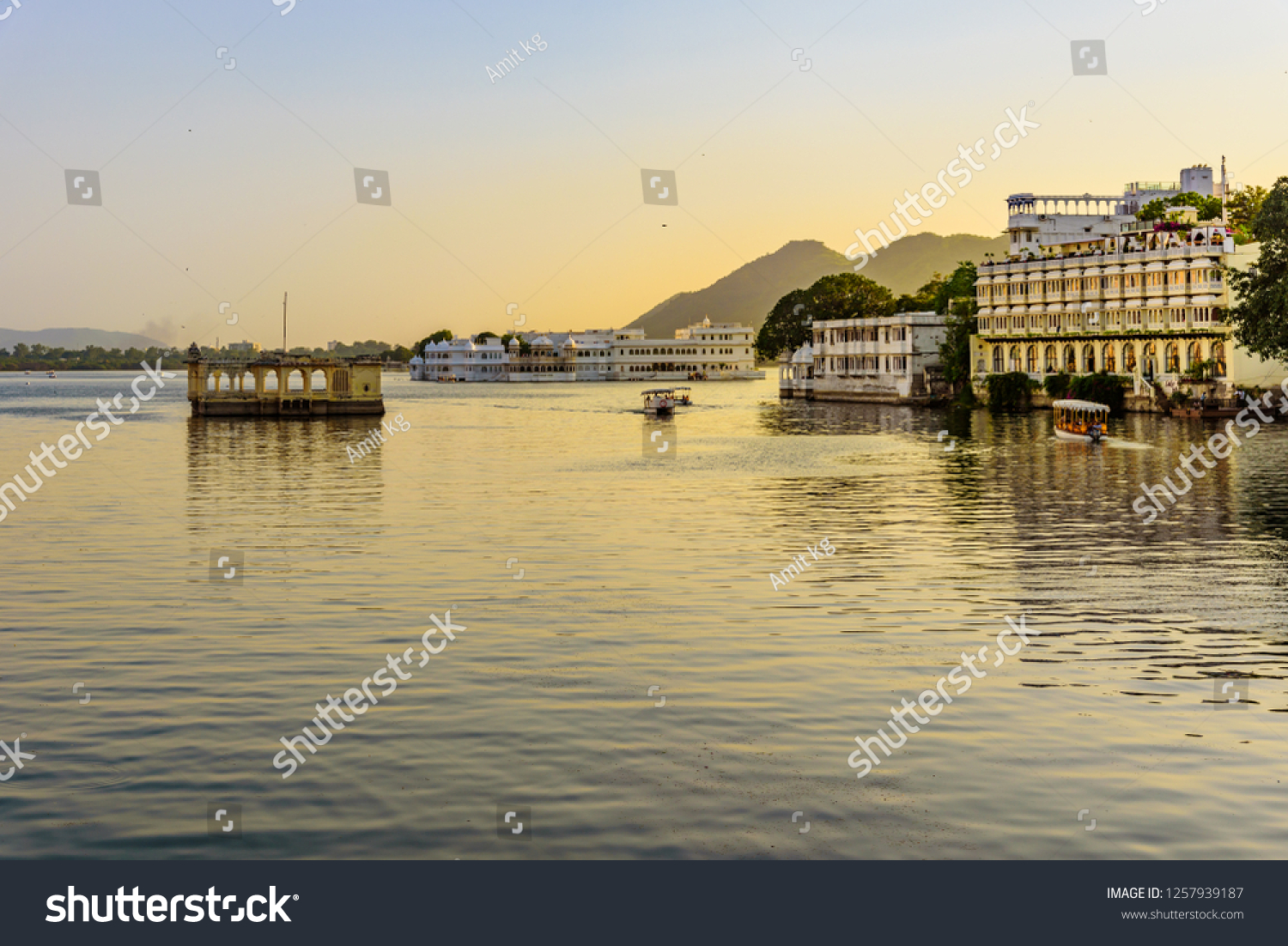 Panoramic view of city of lakes Udaipur with lake Pichola from Ambrai ghat Rajasthan India.