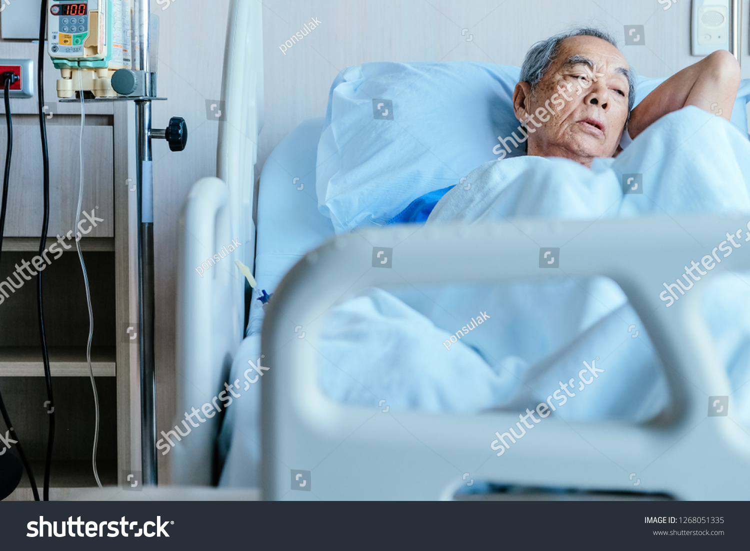 Elderly patients in hospital bed