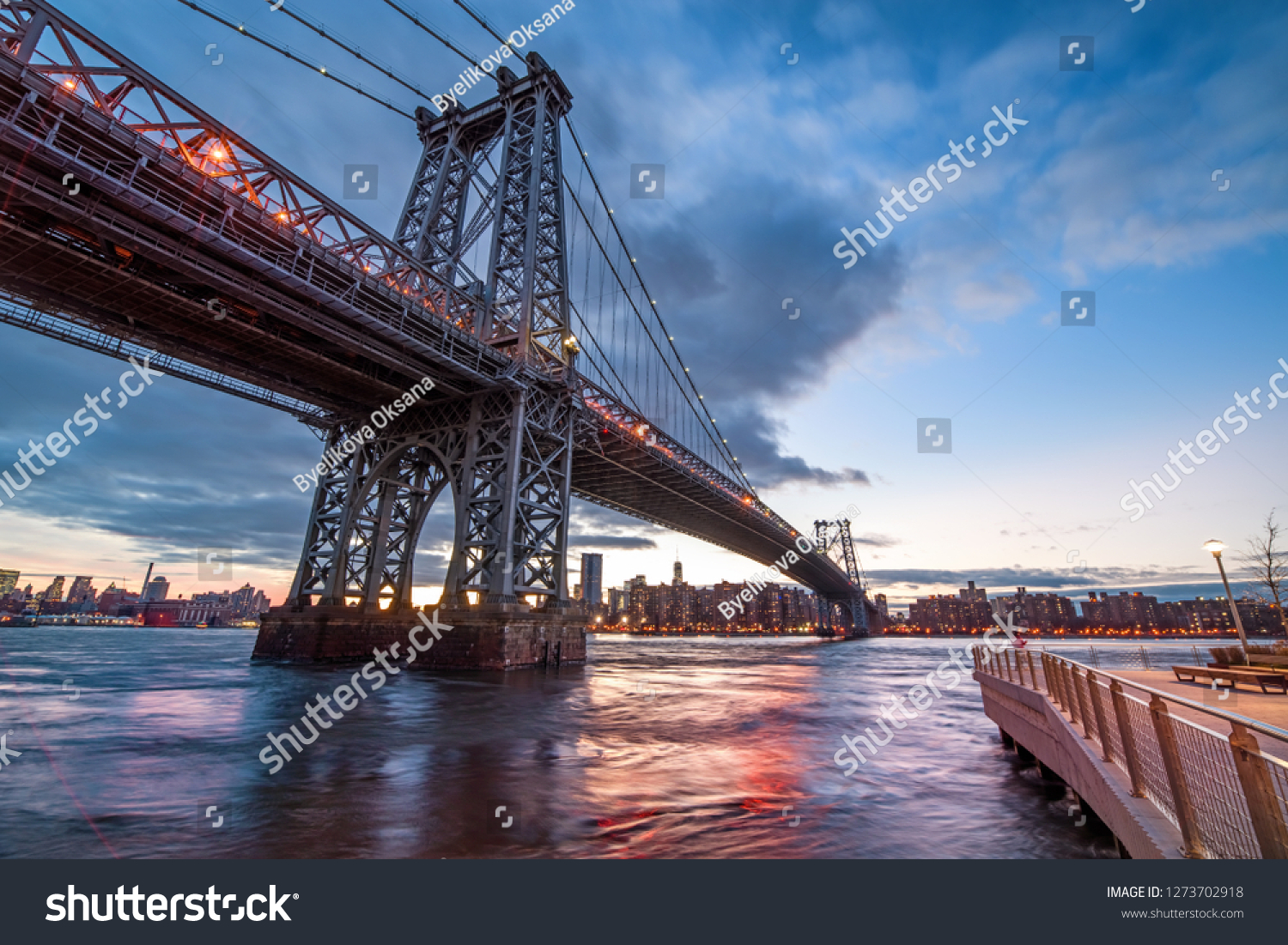 The Williamsburg Bridge is a suspension bridge across the East River at night in New York City   USA