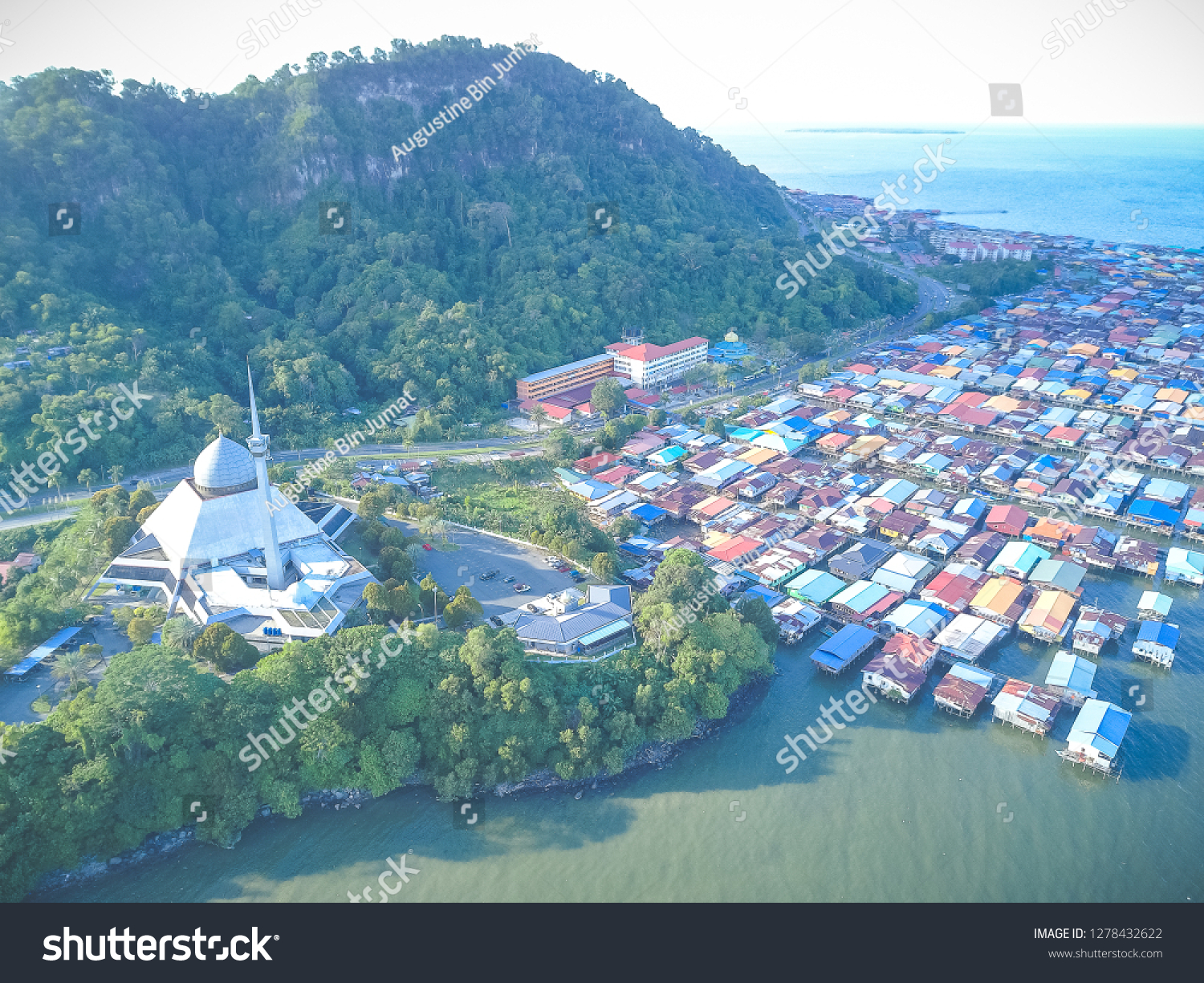 Sky view of Sandakan City with Sandakan District Mosque Kg. Sim Sim water village and Berhala Island.
