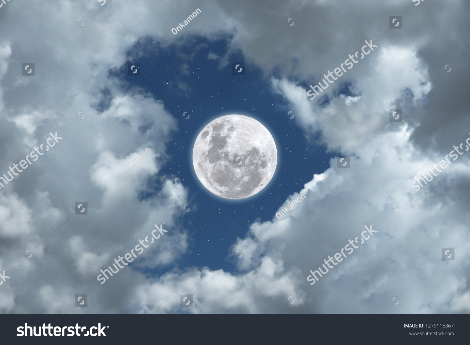 Moon with white cloud on blue sky.