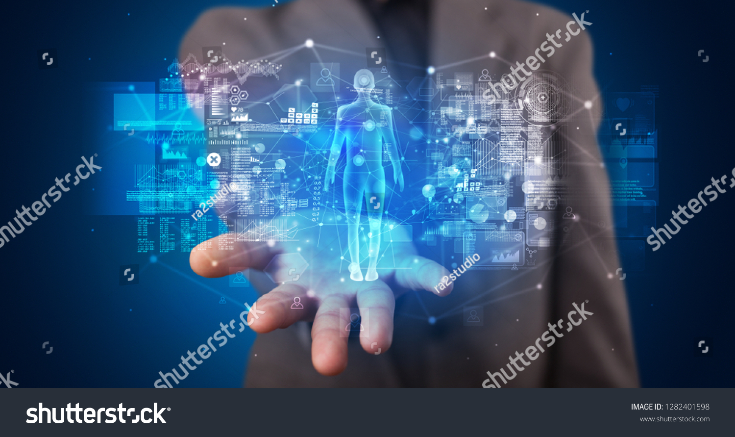 Young person holding hologram projection displaying health related graphs and symbols