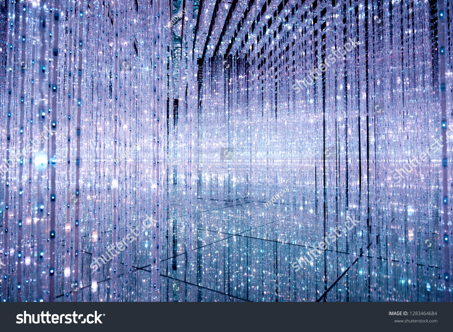 Abstract empty room with large group of led lights.