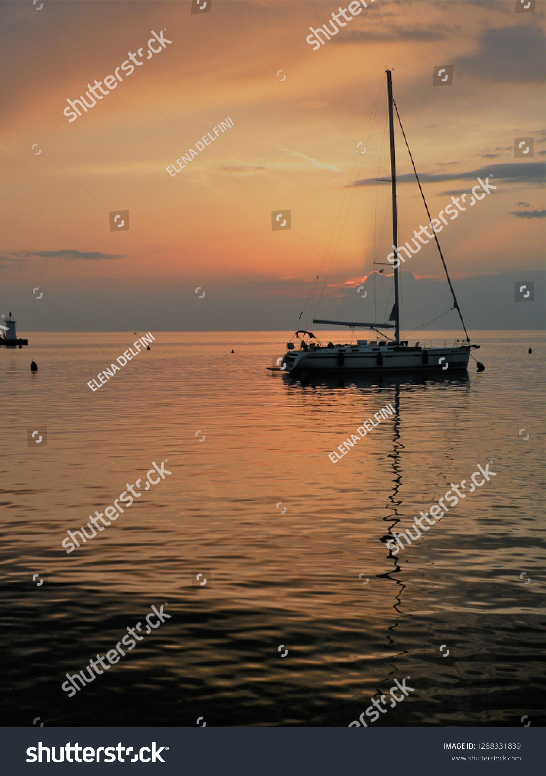 sailingboatfloatingonapeacefulsurfaceoftheadriaticseacroatia