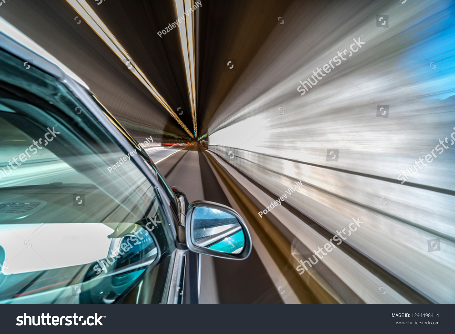 Car in motion blur driving in the Mountains
