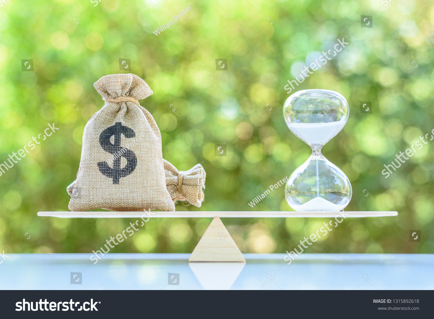 Dollar bags  sand clock or hourglass on a balance scale in equal position